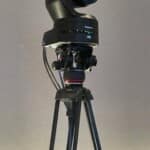 A PTZ camera captures the meeting for your chosen conferencing platform PTZ Camera on tripod