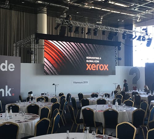 Room set up forXerox in Portugal. Interpreters are backstage